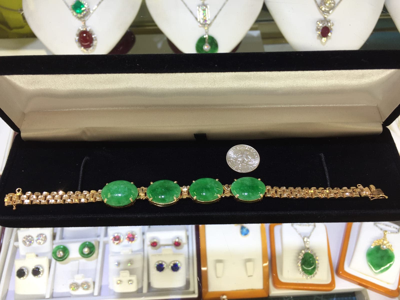 Imperial Green Jadeite Four-Stone Gold Bracelet