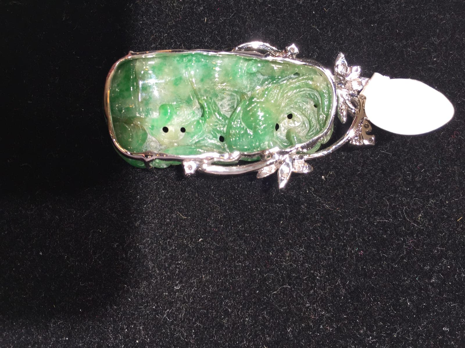 Carved Jadeite Pendant — Floral Motif