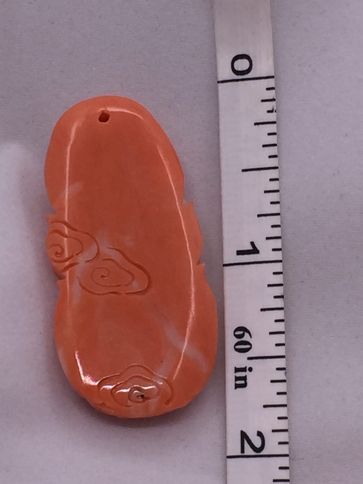 Carved Coral Ruyi Scepter Pendant