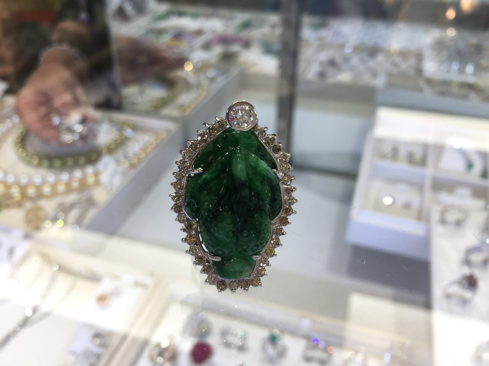 Carved Imperial Green Jadeite Pendant — Diamond Halo