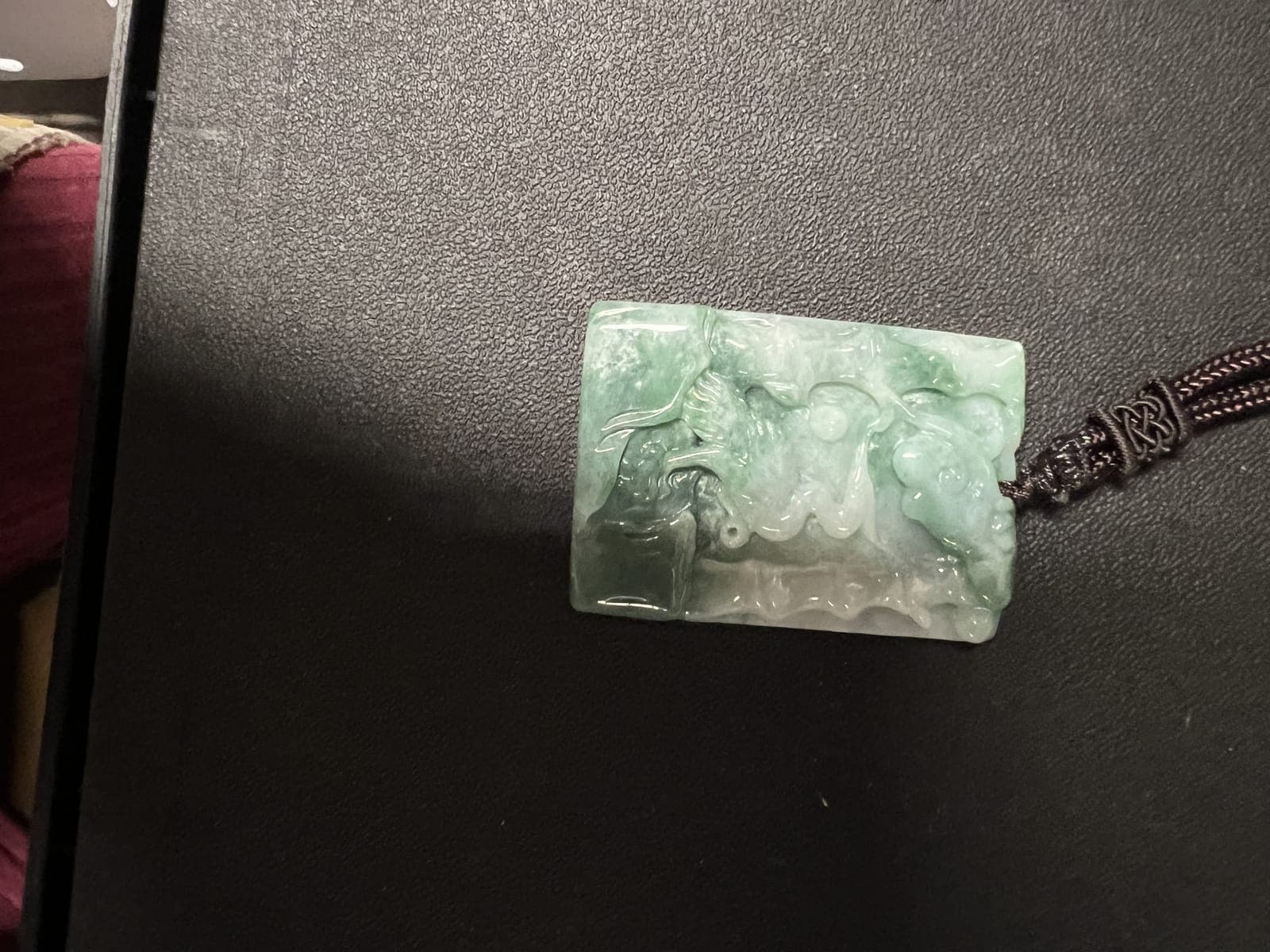 Carved Jadeite Landscape Pendant on Braided Cord