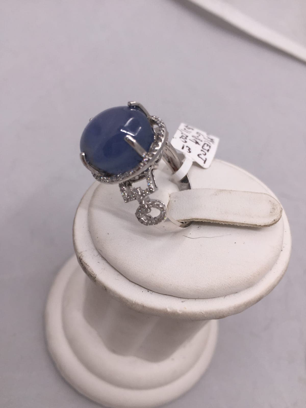Star Sapphire Ring with Diamond Key Charm — $31,000